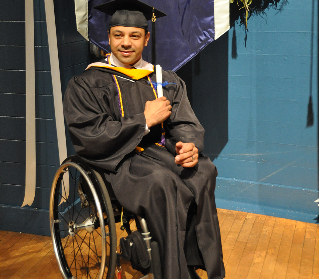 Male student wheelchair user at graduation