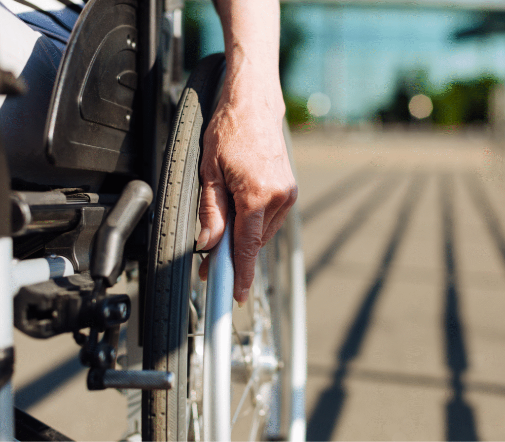 Can manage it on my own. Elegant persistent senior woman being out and about while managing the chair in her own and enjoying it